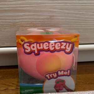 Squeezy Peach Squishy Toy really rare never been opened